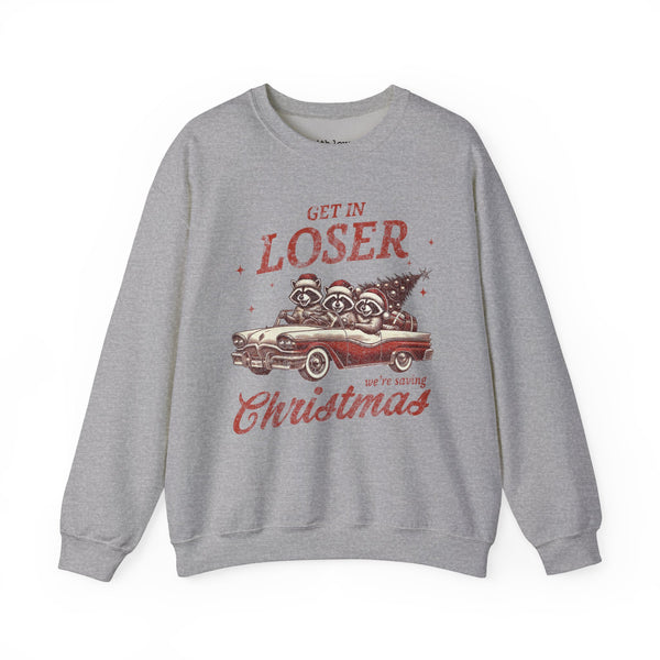 Get in Loser, We’re Saving Christmas Raccoon Unisex Heavy Blend Crewneck Sweatshirt