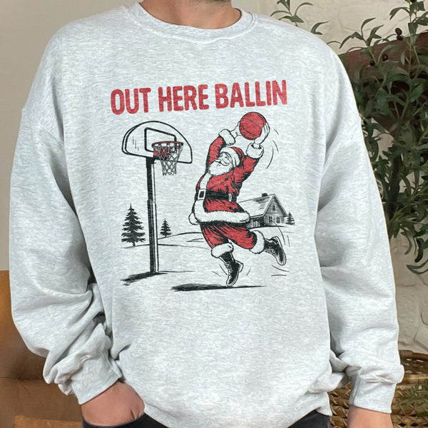 Out Here Ballin’ Funny Santa Christmas Basketball Unisex Heavy Blend Crewneck Sweatshirt