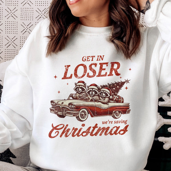 Get in Loser, We’re Saving Christmas Raccoon Unisex Heavy Blend Crewneck Sweatshirt