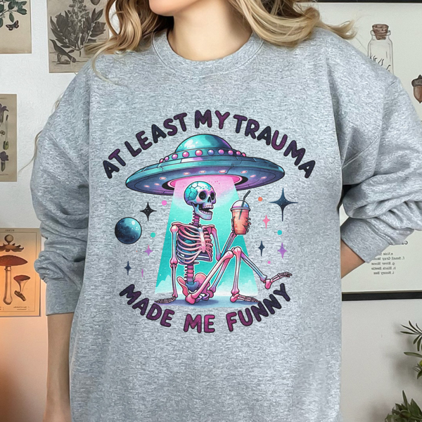 At Least My Trauma Made Me Funny UFO Skeleton Mental Health Unisex Heavy Blend Crewneck Sweatshirt