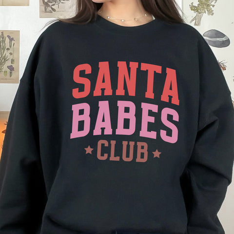 Santa Babes Club Christmas Unisex Heavy Blend Crewneck Sweatshirt