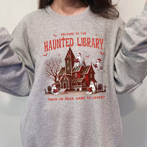 Welcome to the Haunted Library Christmas Ghosts Book Unisex Heavy Blend Crewneck Sweatshirt